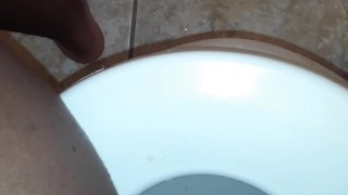 PISSING ON THE TOILET SEAT AND FLOOR