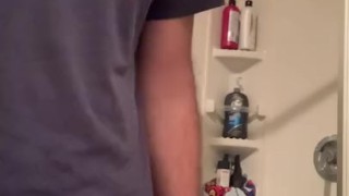 Horny frat boy caught jerking off in college bathroom
