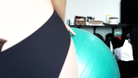 She rides the dildo on the Yoga ball and has orgasm with the vibrator