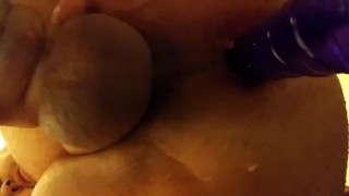 Purple glass toy in the ass after shower 