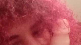 Cute crossdresser in pink sucks dildo