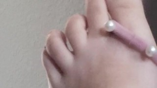 Trying to get a hair tye off my foot NO HANDS