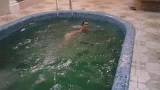 Girl jumps naked into the pool