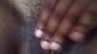 Amertuer African girl plays with her clit till she orgasms. 