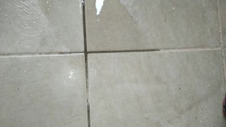 Hairy pussy with big lips takes a long piss on the balcony