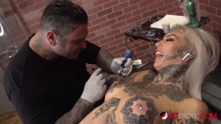 Amber Luke masturbates while getting tattooed