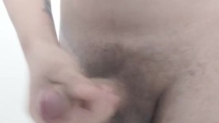Young guy masterbating in bathroom