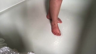 Sarah Feet in shower. Rubbing soap on feet. 