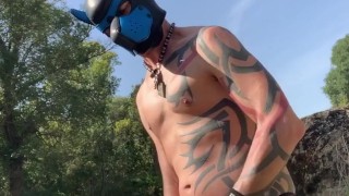 Rubbing this huge cumshot out along the river before someone catches me