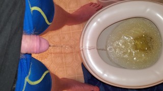 Pissing with the toilet seat down.