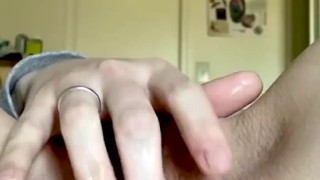 MILF plays with her wet pussy