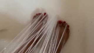 Washing My Sexy Red Christmas Toes 
