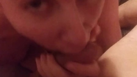 Swallowing his cock while I finger his asshole