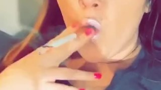 Hot Cam Girl Smokes While Rubbing Her Tits