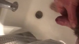 Small uncut cock feet play in shower part 2