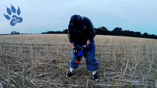 Baggy-Skater-Pup pawing off out on field sniffing Airmax 270