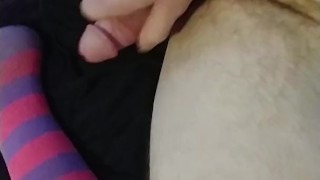Horny slut in knee high striped socks jacks off and cums hard closeup