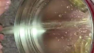 Small piss in empty cookie container 