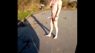 Naked in road with pump on