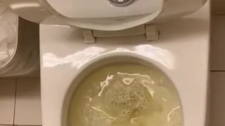 Teen pisses and play with his dick in work bathroom
