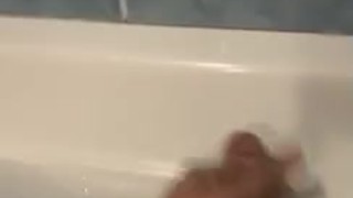 Teen jerks and cums during bath time 