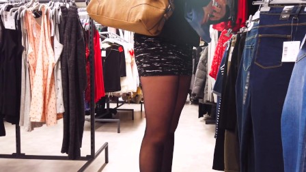 MILF in mini-skirt and puffy jacket