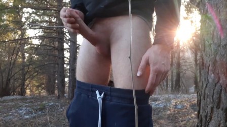 After a morning run, the guy took off his boner in the forest