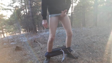 After a morning run, the guy took off his boner in the forest