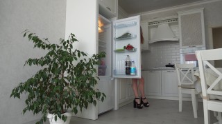Fridge Humping. Gorgeous Milf in a bathrobe cums on the fridge door