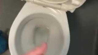 Masturbating in public toilets with big cumshot 