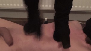 ebony boots trample dance on human doormat