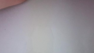 Slut Pissing in Bathtub