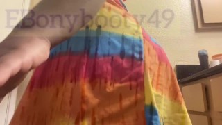 Girl ripping nasty bubbly farts in rainbow dress