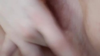 Hot redhead touching herself