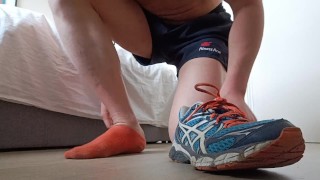 That guy comes home and removes his trainers and socks