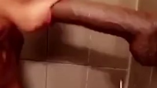 Practicing on a big dildo 