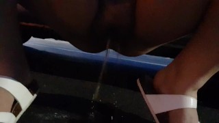 Pissing in a parking lot