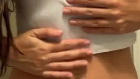 Playing with my nipples and squeezing my perky tits