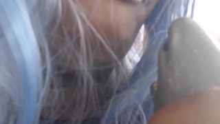 Giantess gnawing on a shark