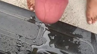 Pissing and jerk off in public in front of a car