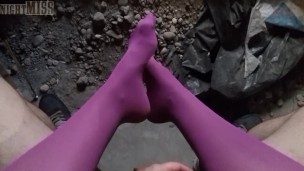 POV video of NightMiss feet in purple pantyhose giving sloppy handjob