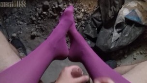 POV video of NightMiss feet in purple pantyhose giving sloppy handjob