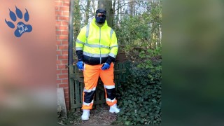 quick pawing off in hi-vis tracksuit and sneakers outdoors