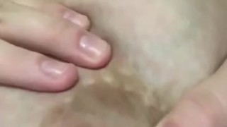 Hand expressing my breastmilk 