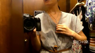 Slutty bitch can't hold back her lust and plays with pussy in fitting room, public masturbation
