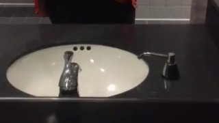Busty teen plays with boobs at work