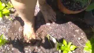  Very Hairy Hirsute Camgirl Shows Hairy Girl Legs Outside in Garden Splashes Muddy Wet Dirty Puddle