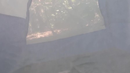 A guy on a hike masturbates in a tent