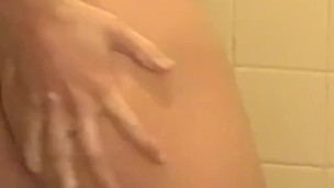 Young man takes shower to play with his big throbbing cock