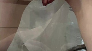 Bubble Butt Slut Spreads Her Cheeks Against Glass and Pisses, Playing With Herself While She Does